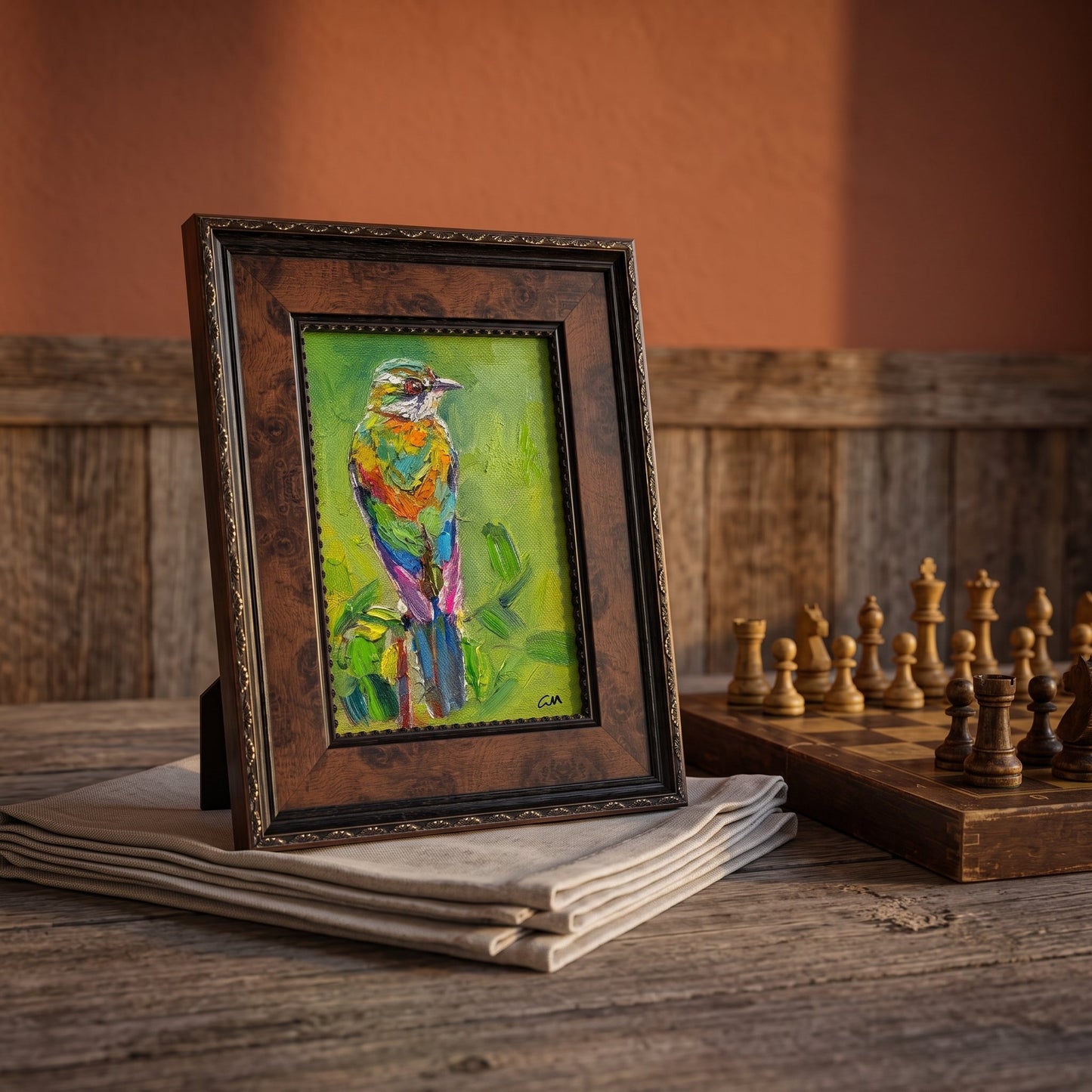 Rustic Farmhouse Study — Vibrant expressionist bird painting adds colorful energy and artistic focus to warm, wood-rich space