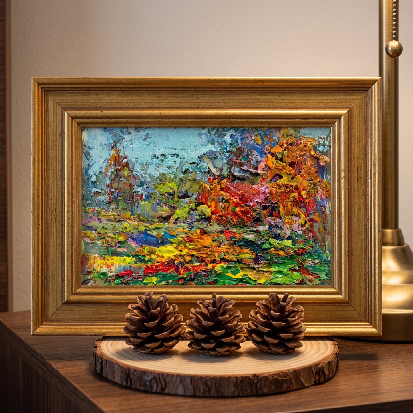 Rustic Farmhouse Living Room — Vibrant expressionist landscape painting adds color and energy to warm, natural decor