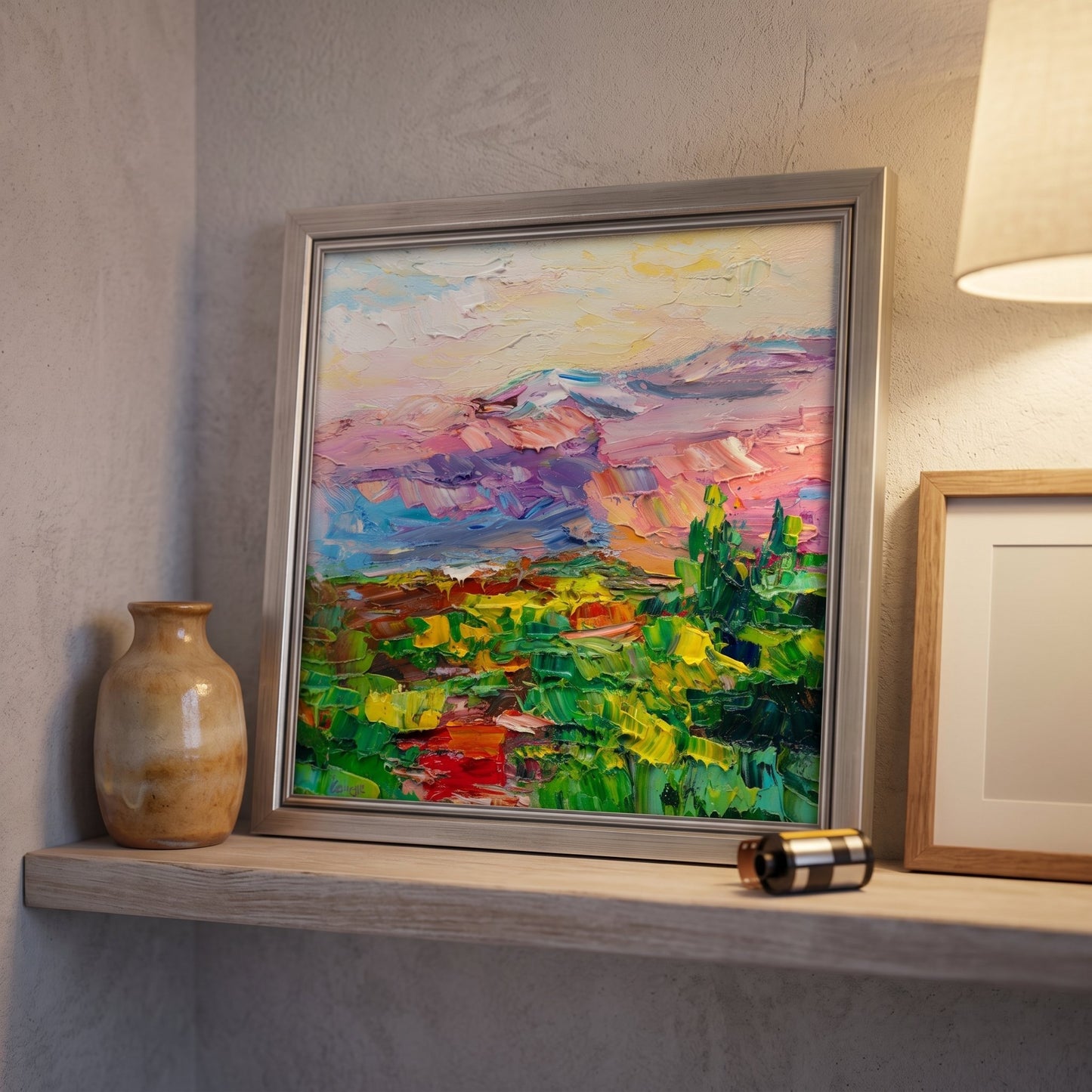 Minimalist living room — vibrant Impressionist landscape painting elevates neutral space with bold color and texture