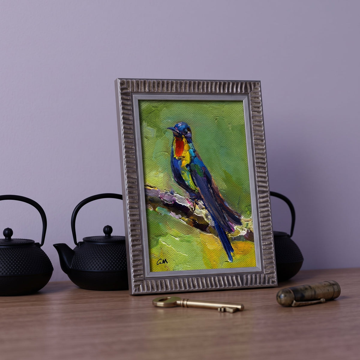 Minimalist study — Vibrant expressionist bird painting adds color and life to a serene workspace