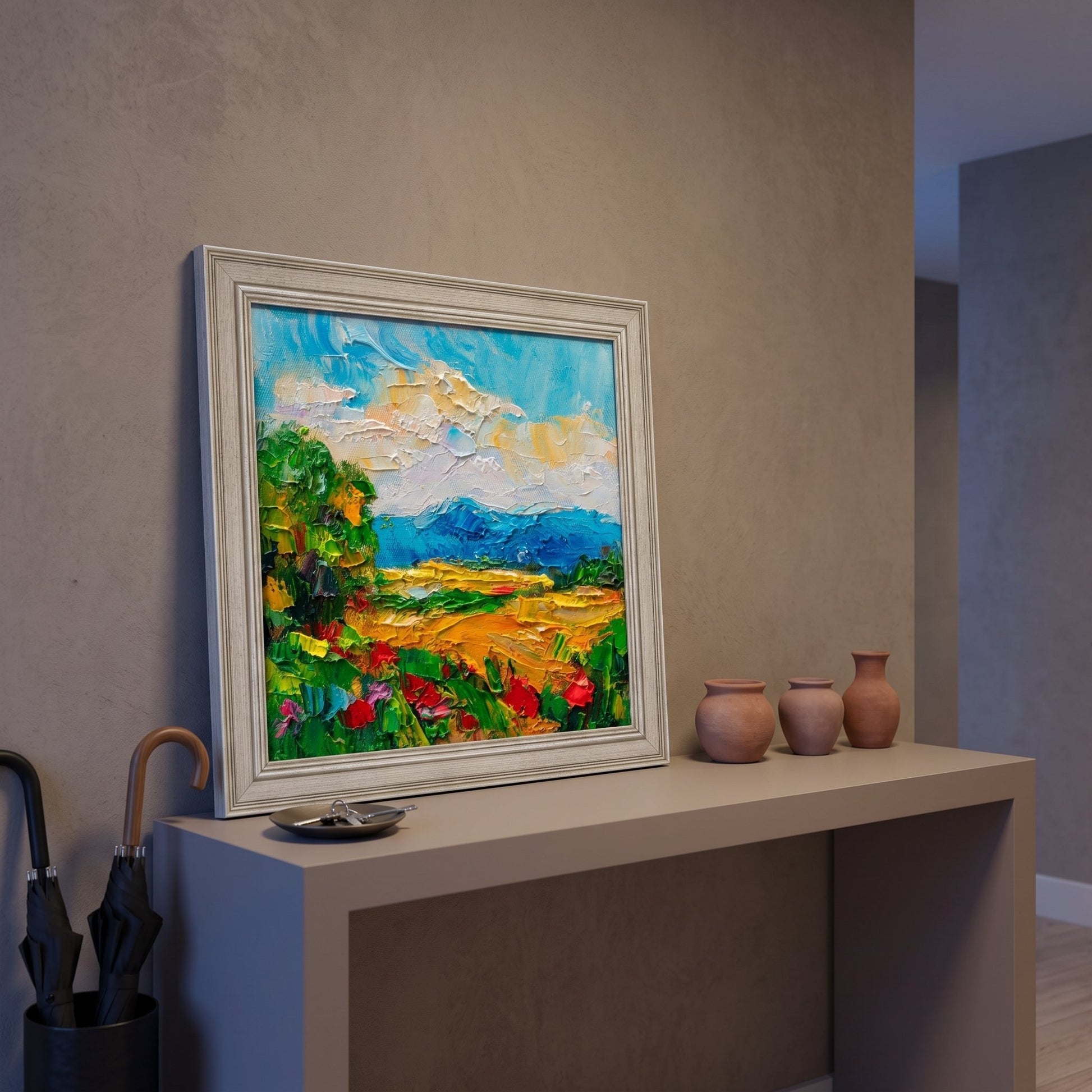 Minimalist entryway — vibrant Impressionist landscape transforms neutral space with bold color and texture