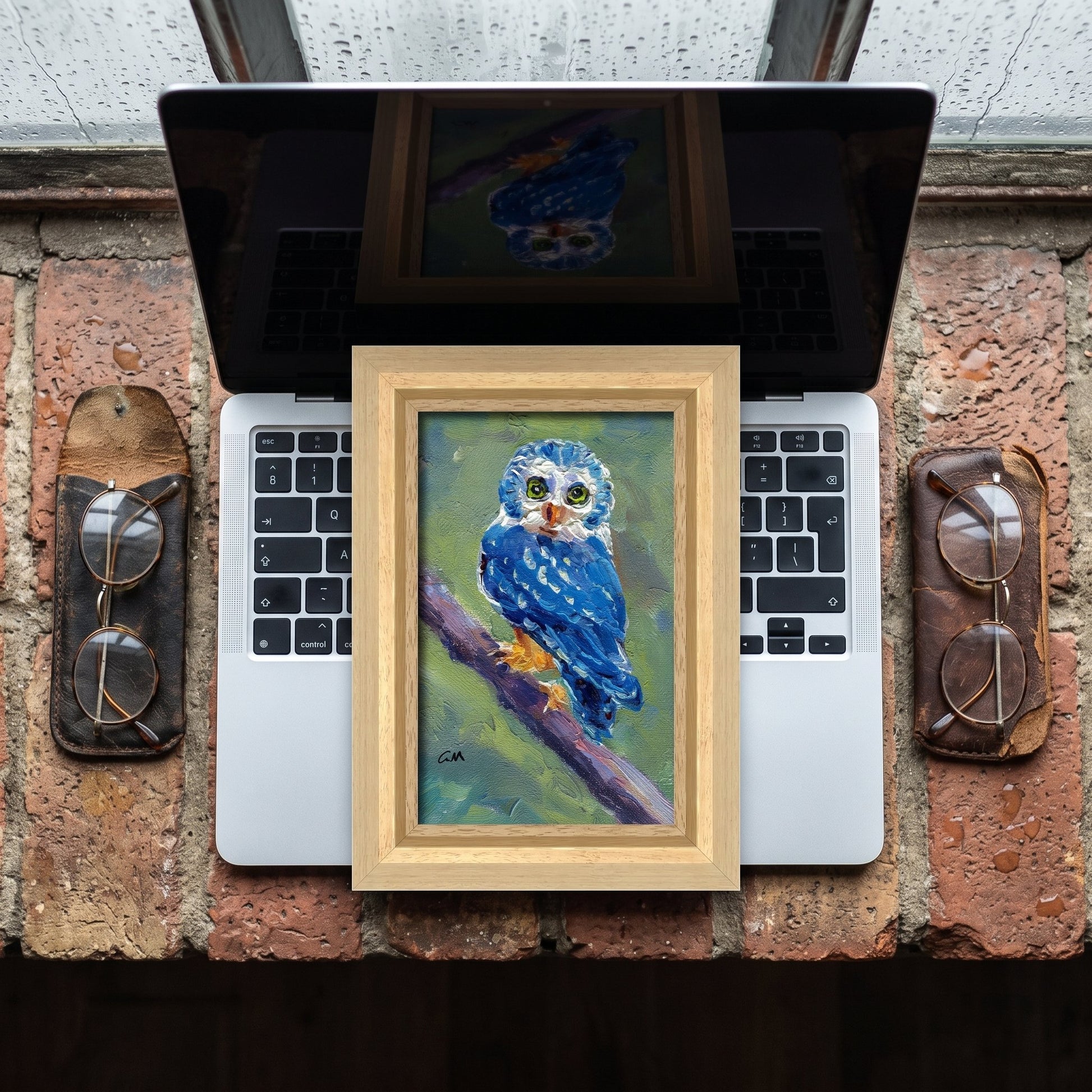 RusticIndustrialStudy — Original expressionist owl painting brings vibrant color and soulful focus to a weathered brick workspace