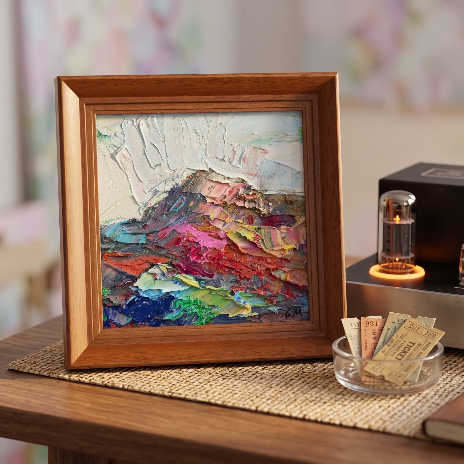 Contemporary living room — Expressive abstract landscape painting adds vibrant color and texture to a minimalist space