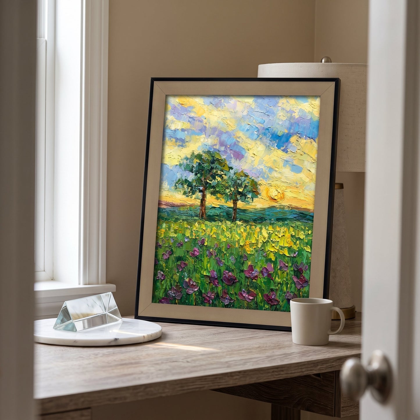 Home office, Scandinavian — Impressionist landscape painting brings vibrant color and artistic warmth to a minimalist workspace
