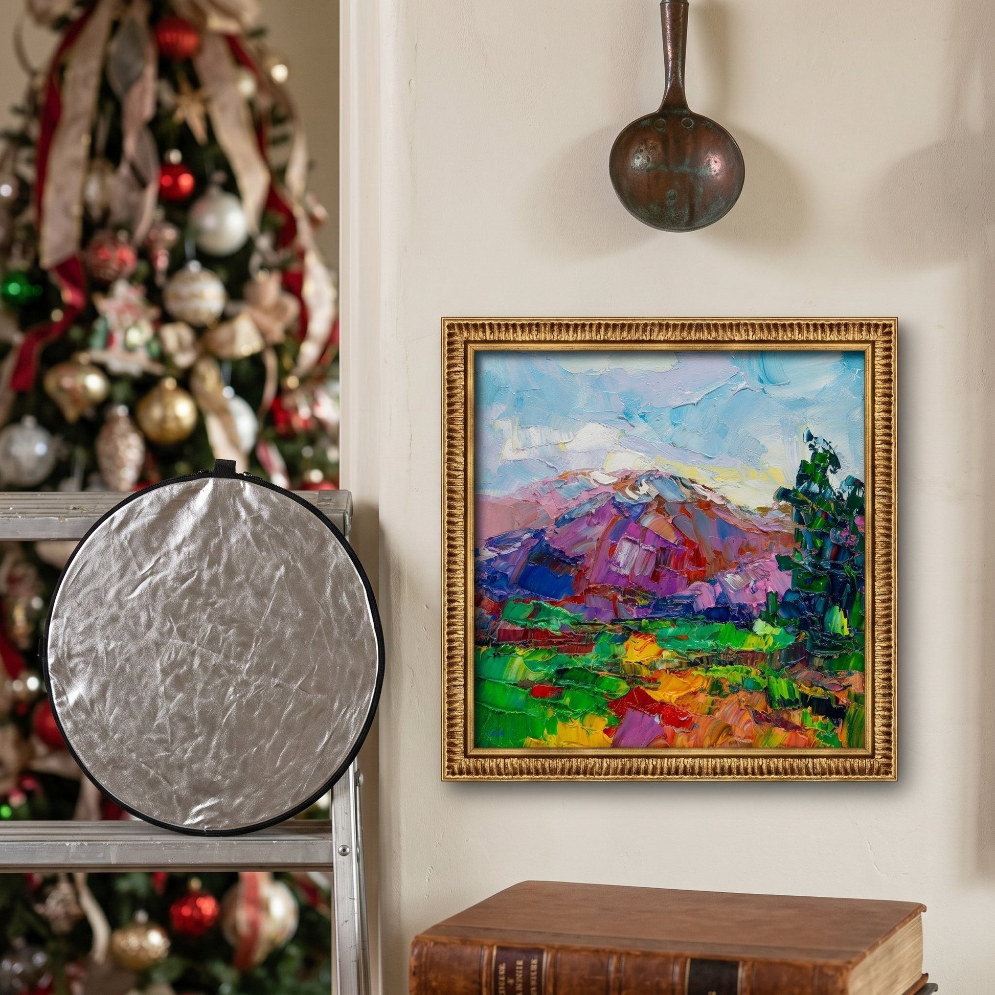 Eclectic living room — vibrant expressionist landscape painting adds bold color and artistic energy to festive, vintage-inspired decor