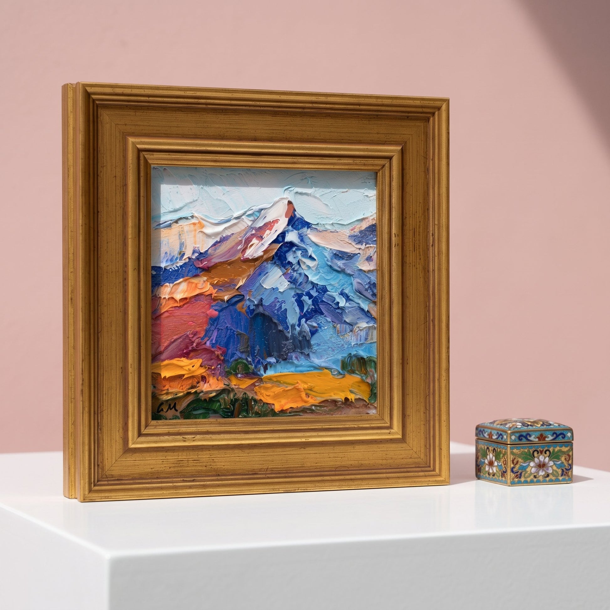 Minimalist living room — Expressive landscape painting adds vibrant color and texture to a serene, modern space