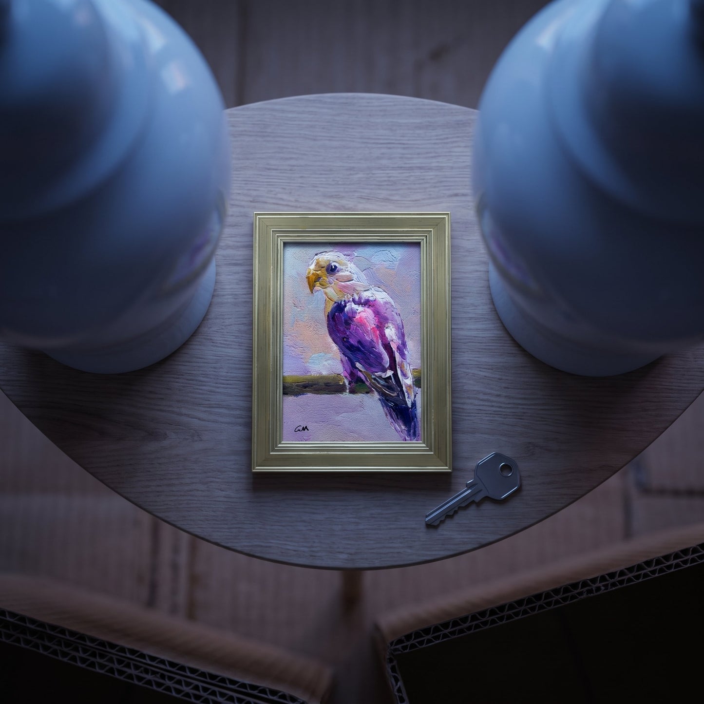 Minimalist entryway — Vibrant expressionist cockatoo painting adds color and character to a serene space