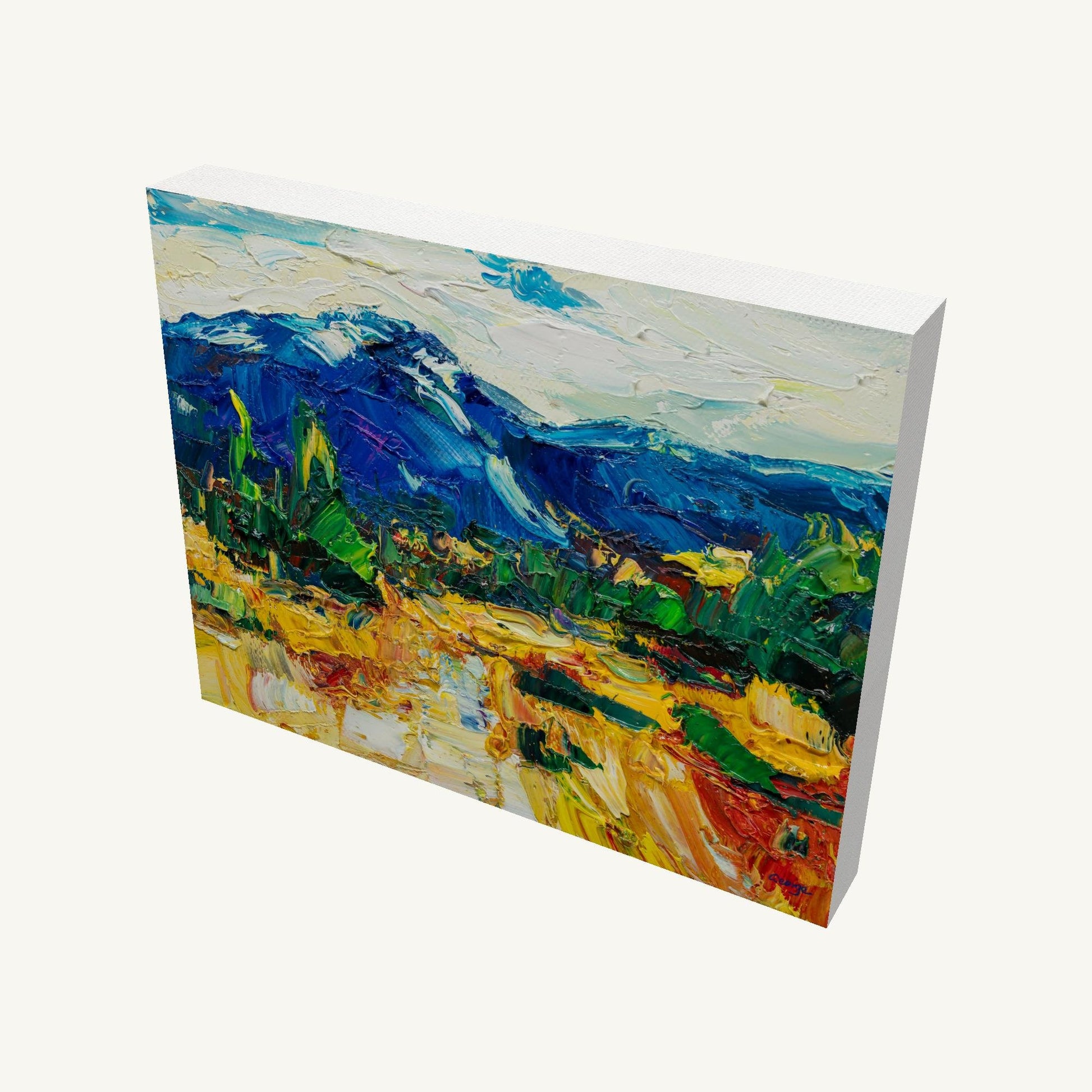 Palette knife mountain landscape painting on gallery-wrapped canvas, viewed at an angle, showing textured oil paint and white sides, casting soft shadow