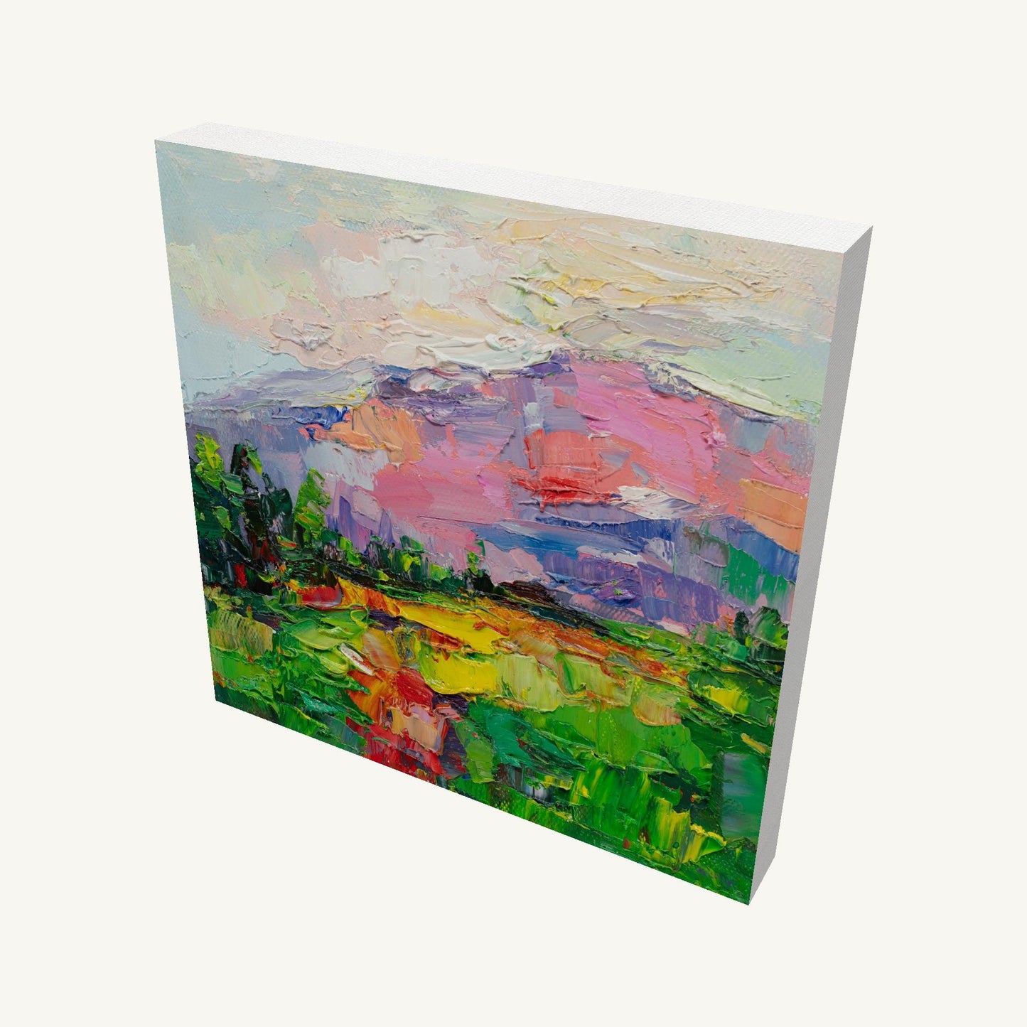 Gallery-wrapped canvas painting of a mountain sunset with thick impasto texture, viewed at an angle showing depth and side edges, unframed and ready to hang