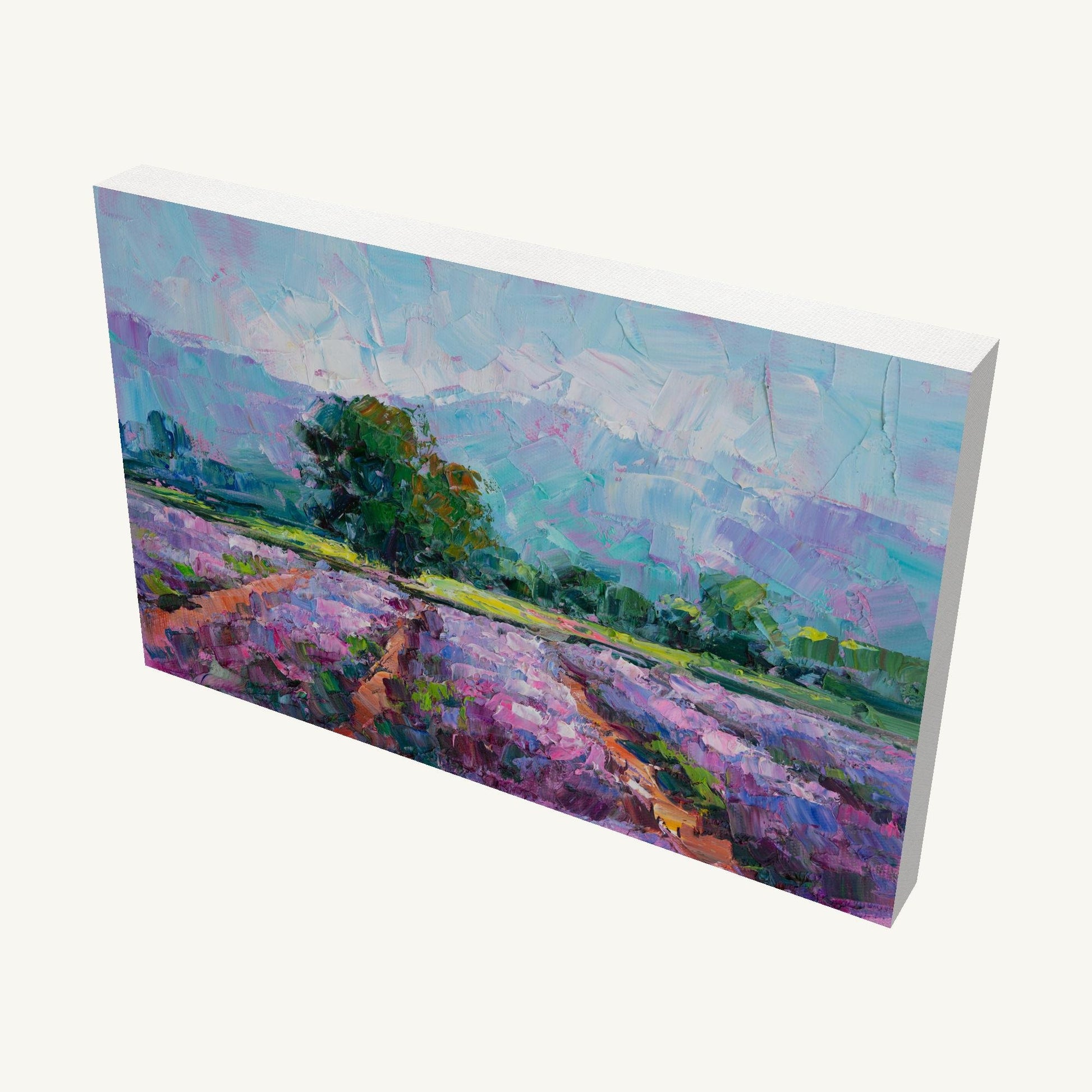 Lavender field oil painting on gallery-wrapped canvas, horizontal landscape with purple blooms, green trees, and blue sky, viewed at an angle showing depth and side edges