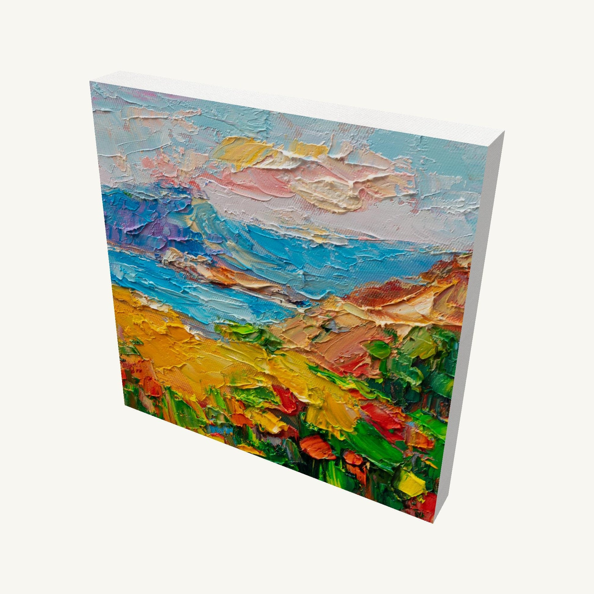 Hand-painted coastal sunset on gallery-wrapped canvas, angled view showing textured oil paint, vibrant blues, yellows, and greens, unframed and ready to hang