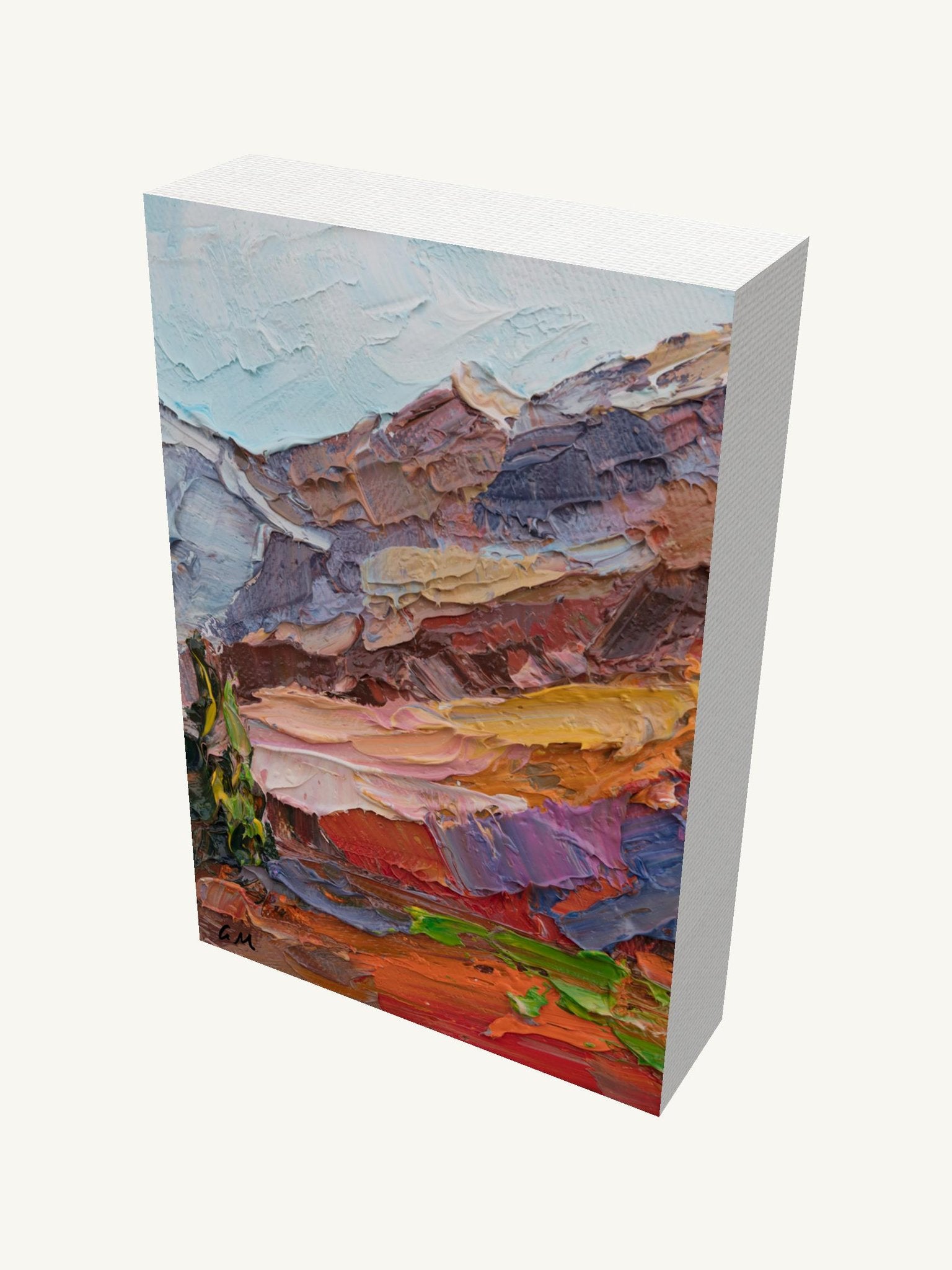 Vertical oil painting of a vibrant canyon landscape on gallery-wrapped canvas, viewed at an angle showing depth and painted edges, unframed and ready to hang