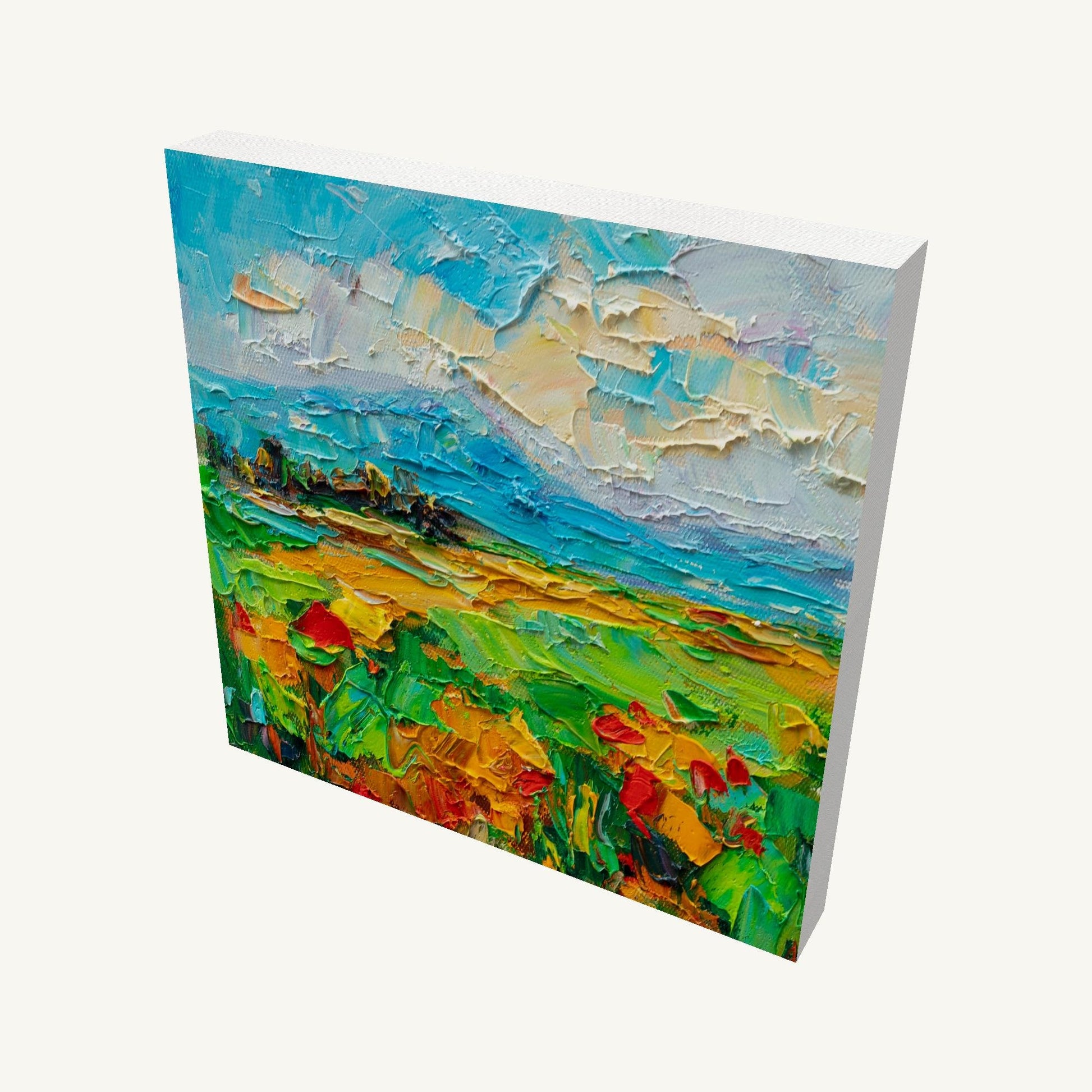 Textured oil painting of a poppy field with vibrant blues, greens, and yellows, gallery-wrapped on canvas, viewed at an angle showing depth and side edges
