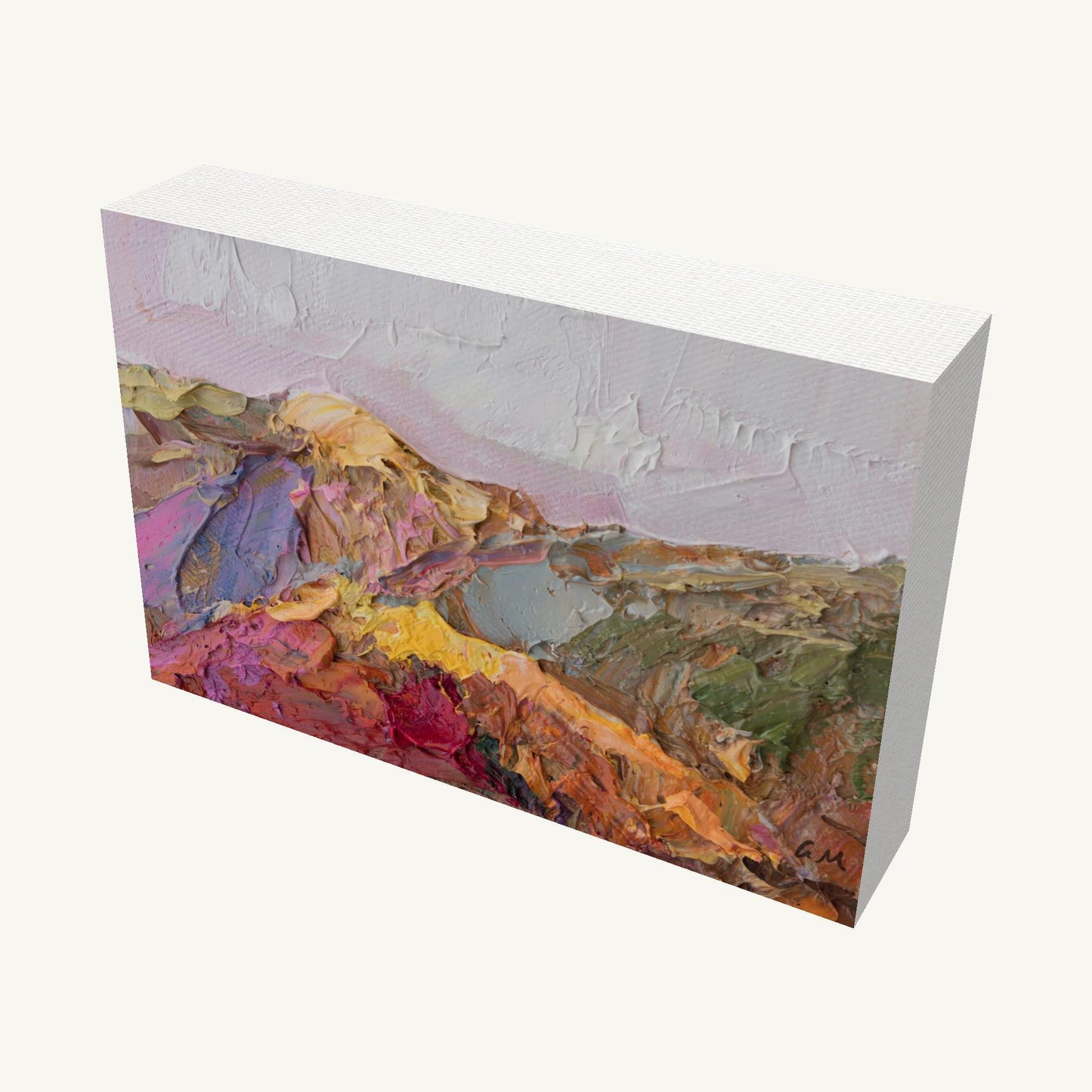 Abstract mountain landscape oil painting on gallery-wrapped canvas, viewed at an angle, showcasing textured brushwork and vibrant colors with visible depth and side edges