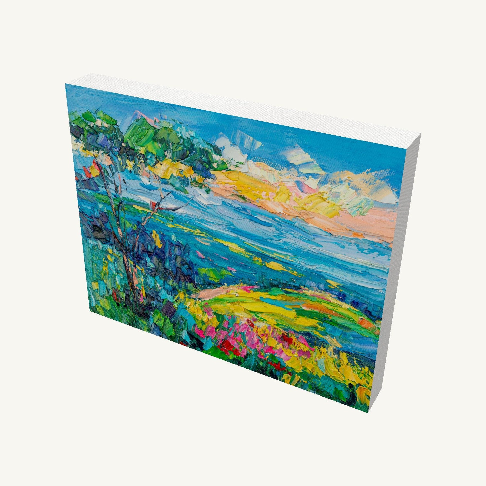 Vibrant landscape painting on gallery-wrapped canvas, angled view showing depth and painted edges, featuring blue sky, green hills, and yellow fields in Impressionist style