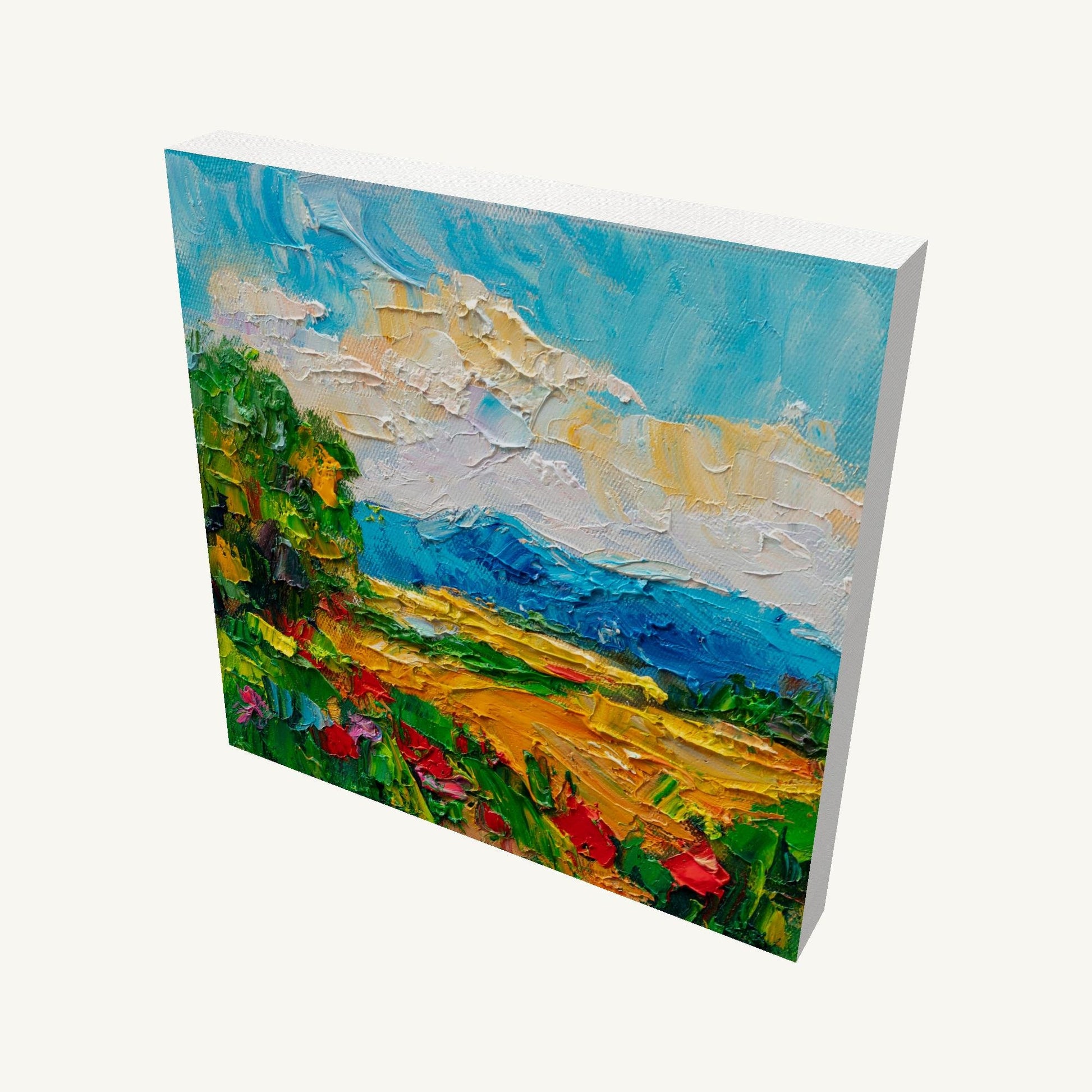 Textured oil painting of a mountain meadow scene on gallery-wrapped canvas, viewed at an angle, showing depth and painted sides