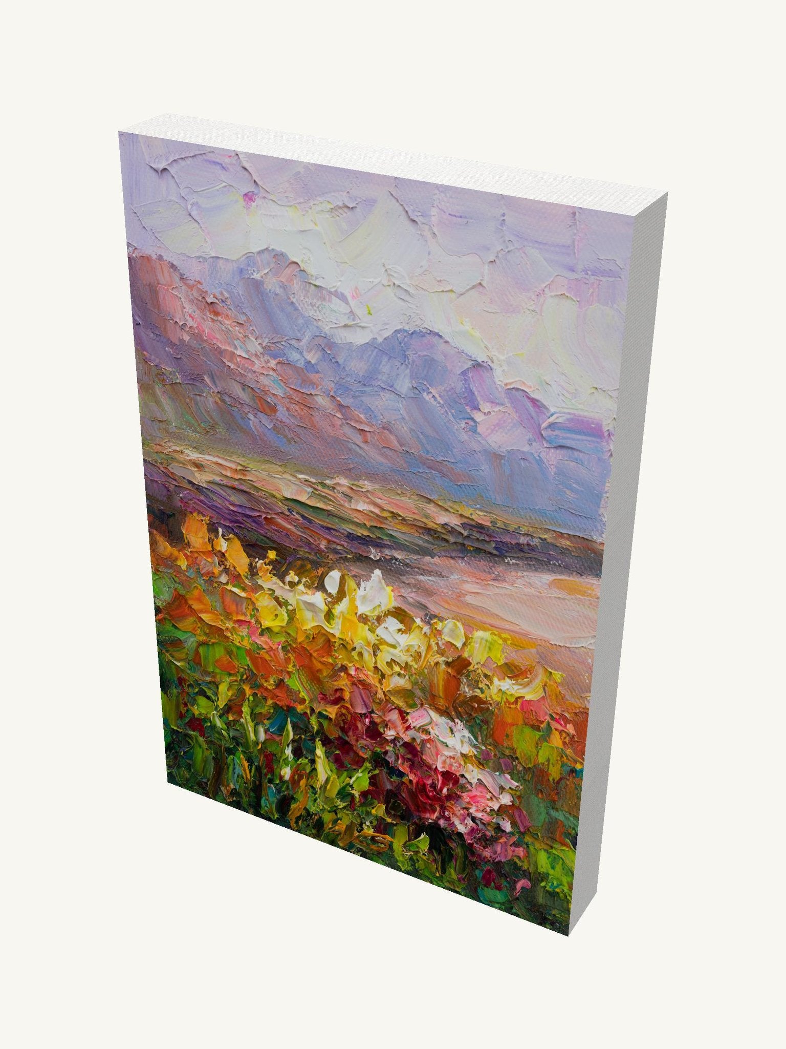 Vertical oil painting on gallery-wrapped canvas depicting a floral field at dusk with vibrant greens, yellows, and purples; viewed at an angle showing depth and side edges