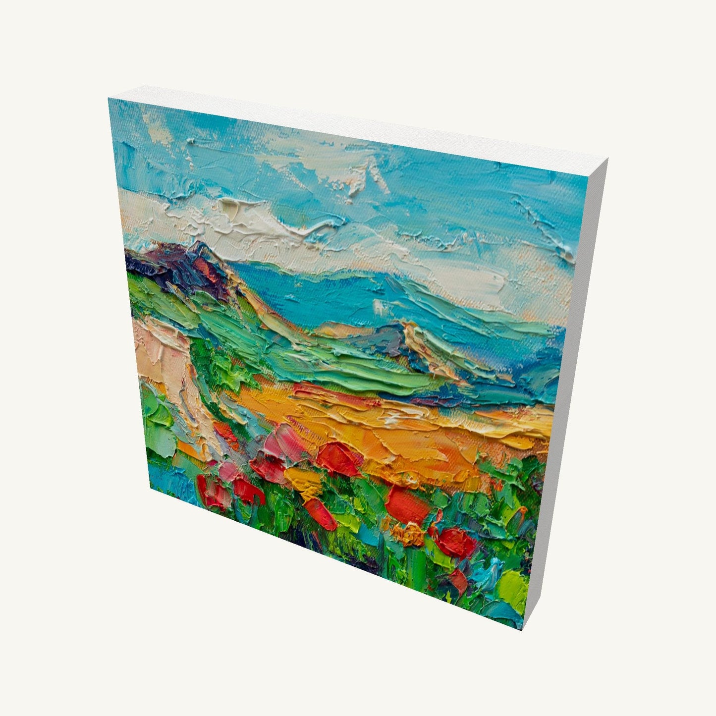 Gallery-wrapped canvas painting of a vibrant mountain meadow with thick impasto texture, viewed at an angle showing depth and side edges, unframed and ready to hang