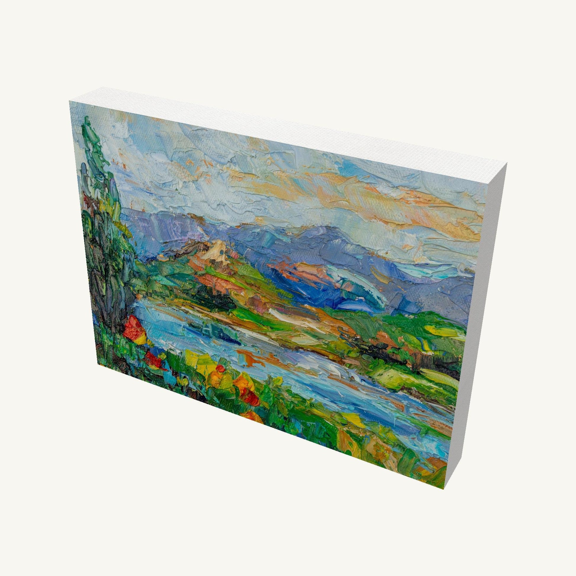 Gallery-wrapped canvas painting of a mountain river scene with thick impasto texture, viewed at an angle showing depth and painted sides, unframed and ready to hang