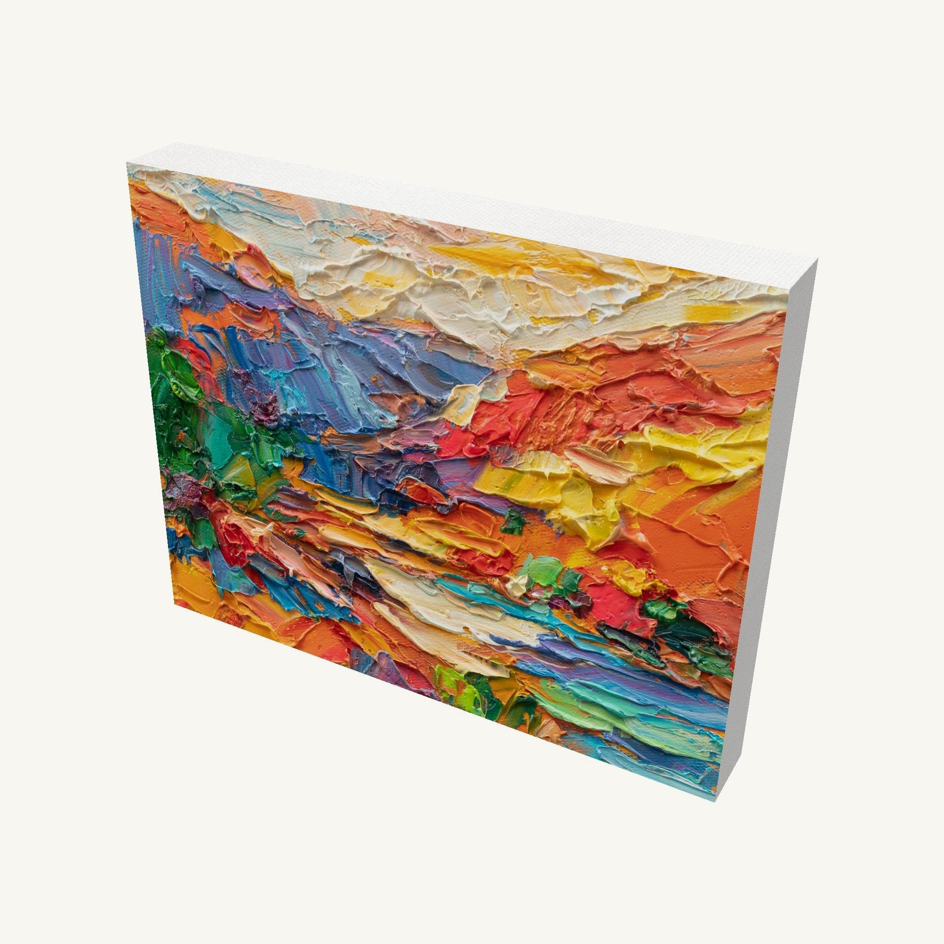 Vibrant impasto sunset landscape painting on gallery-wrapped canvas, viewed at an angle, showcasing thick oil texture and colorful abstract composition with visible side edges and soft shadow