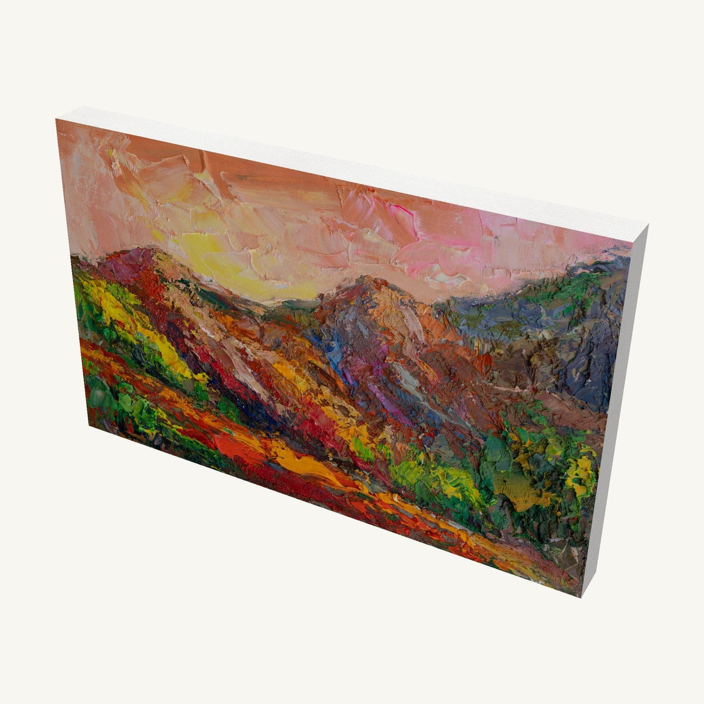 Vibrant impasto mountain landscape painting on gallery-wrapped canvas, viewed at an angle, showcasing thick oil texture and rich colors with visible side edges and subtle shadow