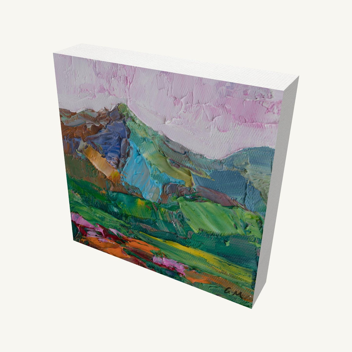 Hand-painted mountain landscape on gallery-wrapped canvas, viewed at an angle, showcasing textured oil paint in green, blue, and pink hues with visible side edges and soft shadow