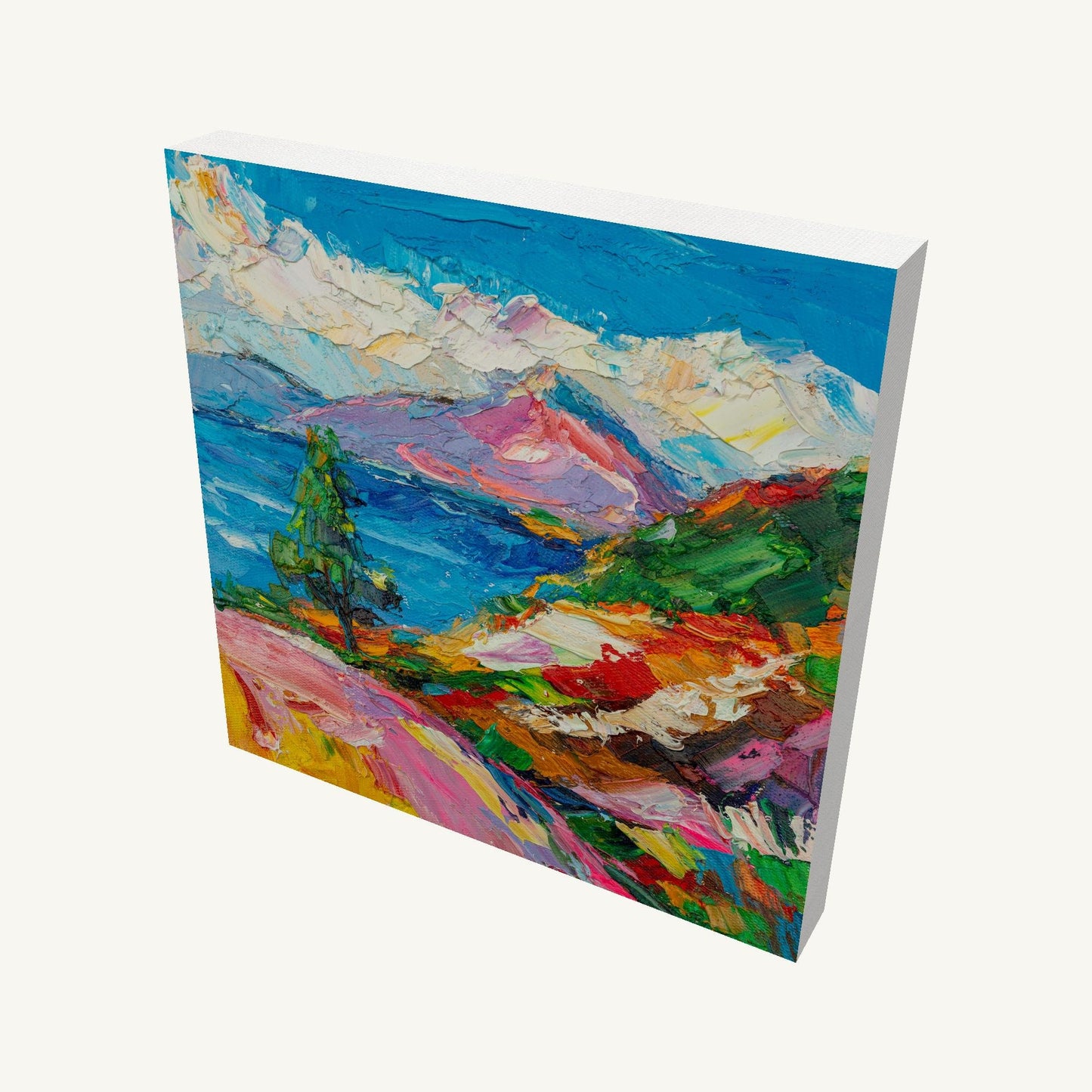 Vibrant mountain lake landscape painting on gallery-wrapped canvas, viewed at an angle, showcasing textured oil brushwork and deep canvas edges with subtle shadow