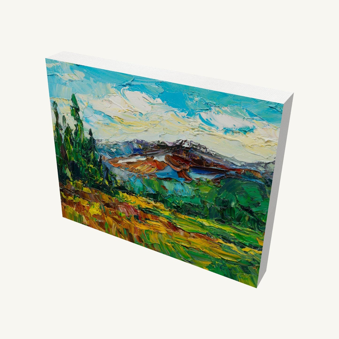 Impasto mountain landscape painting on gallery-wrapped canvas, viewed at an angle, showcasing textured oil brushwork and vibrant greens, blues, and yellows