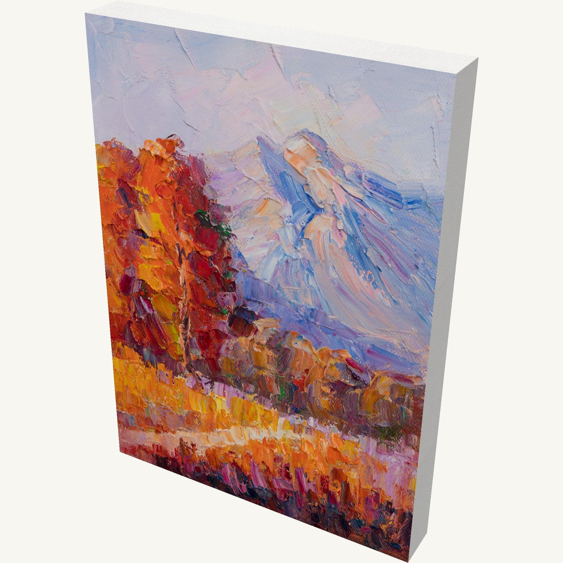 Vertical oil painting of autumn mountain landscape with vibrant orange, red, and blue hues, gallery-wrapped on canvas, viewed at an angle showing depth and side edges